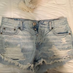 light wash ripped jean shorts